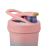 Pink Strada Sleek lid with green lock and button and blue drinking spout. | Color#Breakaway